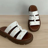 CLAQUETTES BLANCHES